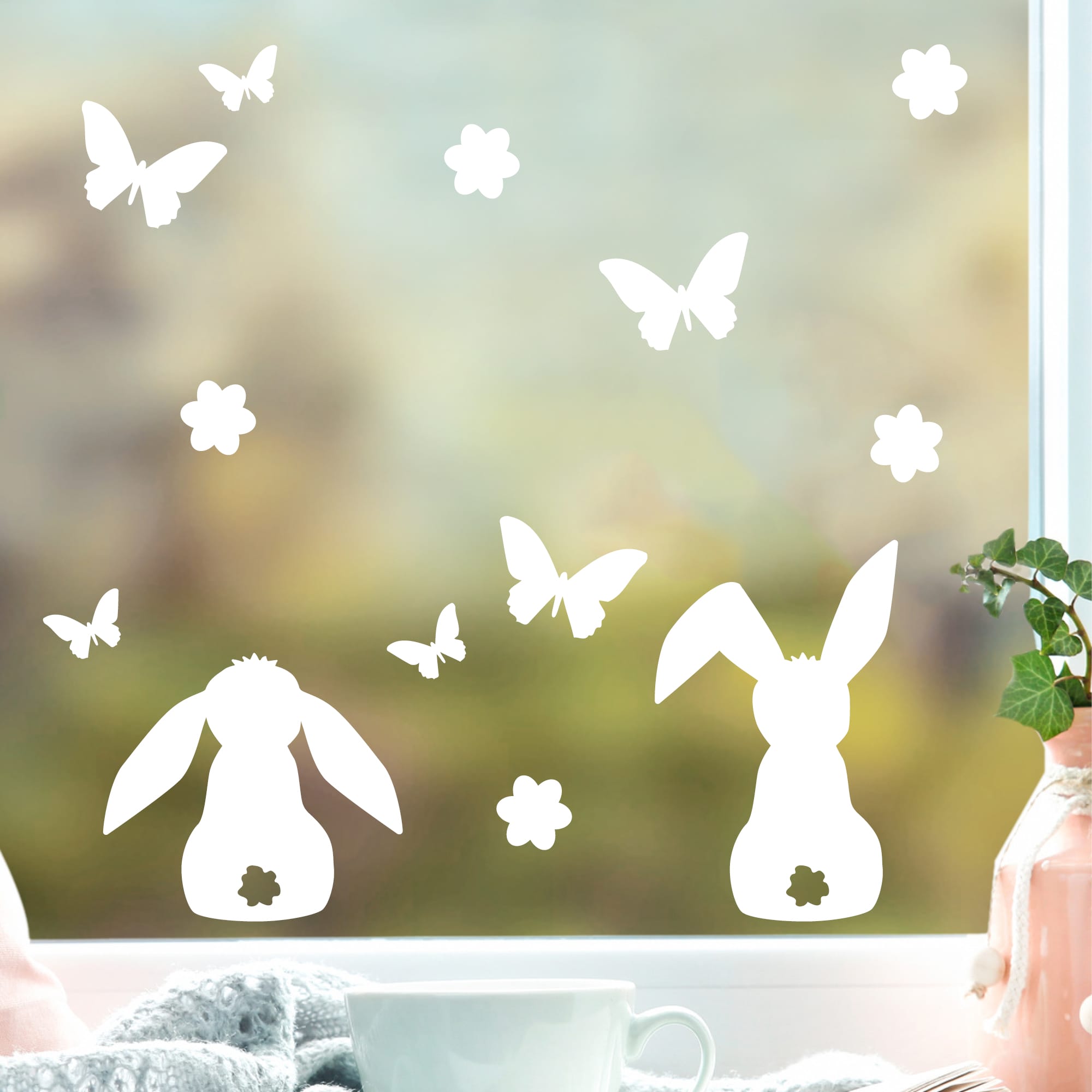 Fensteraufkleber Frühling Ostern drei Hasen Blümchen Schmetterlinge weiß WIEDERVERWENDBAR 23 Aufkleber im SetFensterbild Fensterdeko – Bild 4